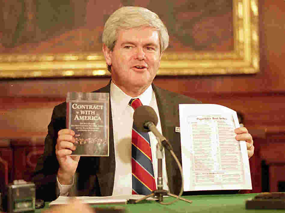 House Speaker Newt Gingrich (R-GA.) holds up his "Contract With America."