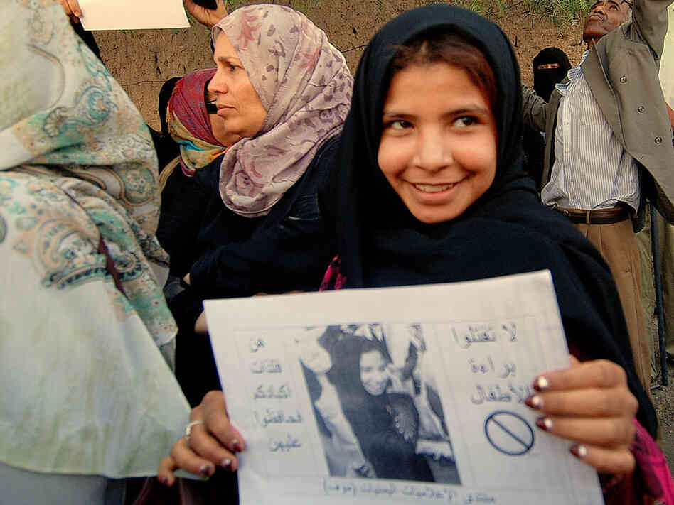 Nujood Ali protests in support of law banning marriage of girls under 17.
