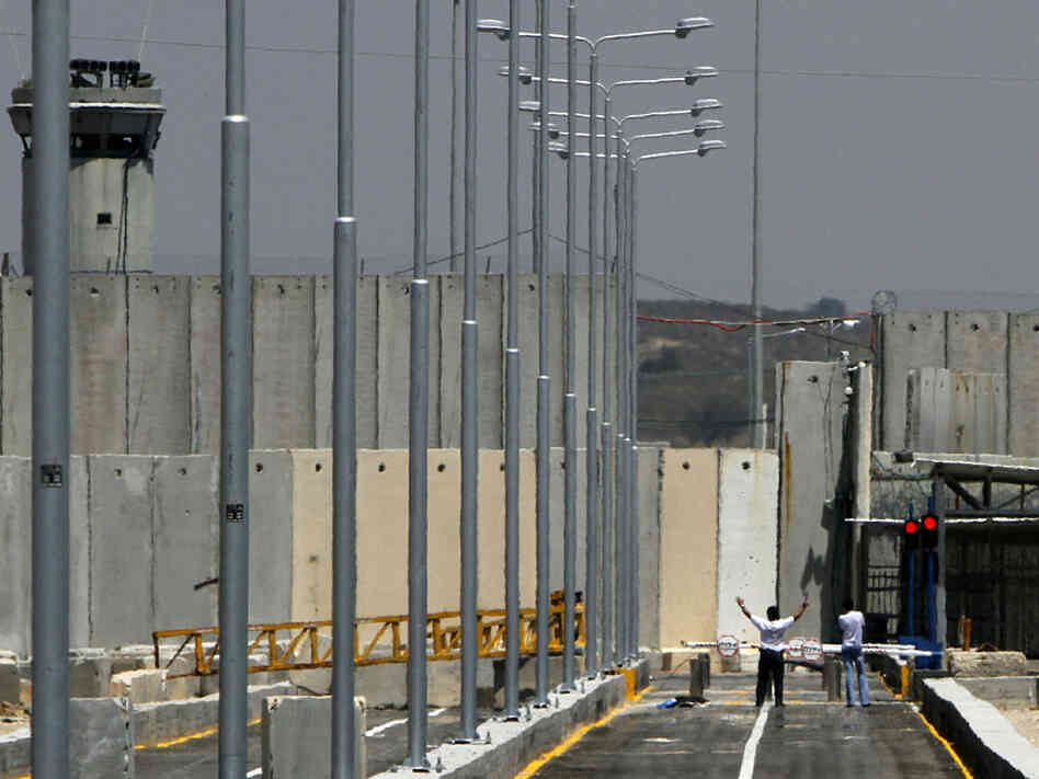 Palestinians deported under a new Israeli order protest to be allowed to return to the West Bank