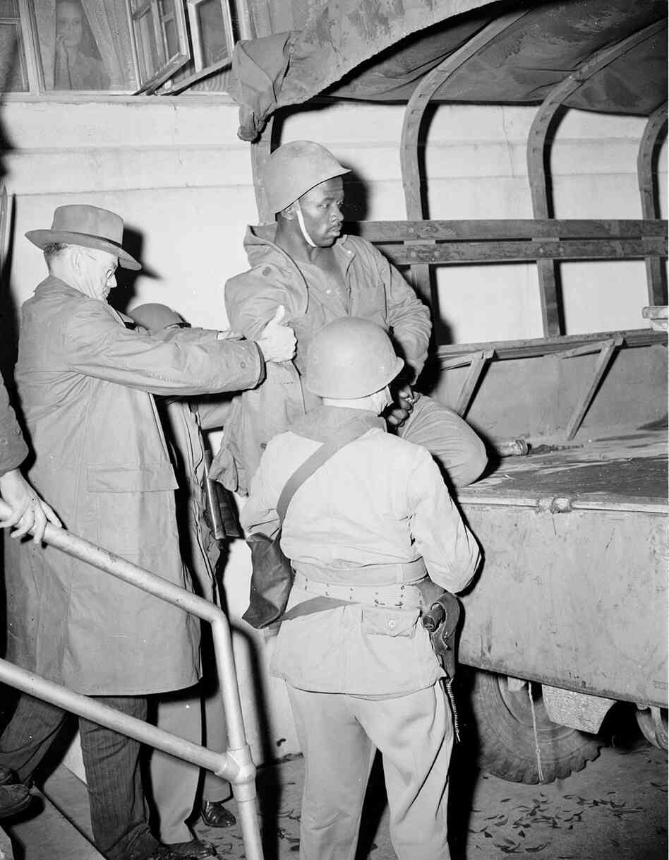 McGee was dressed in a National Guard uniform to disguise his identity.