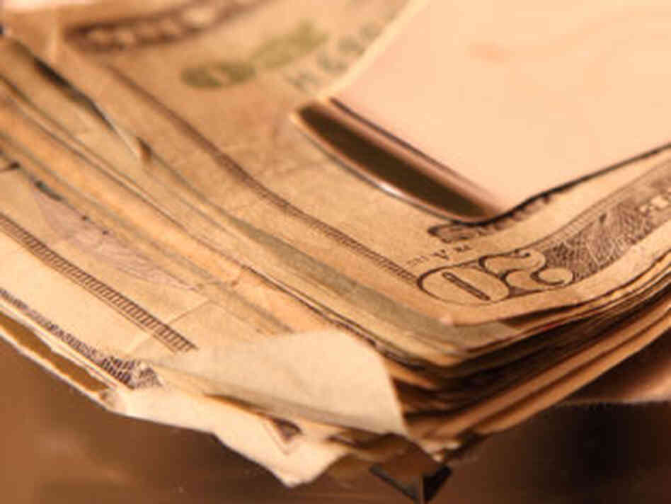 A wad of bills in a money clip. iStockphoto.com A wad of bills in a money clip. iStockphoto.com