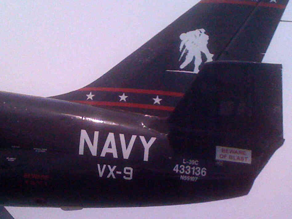 The Wounded Warrior Project's logo on the tailfin of a plane. Ned Wharton/NPR