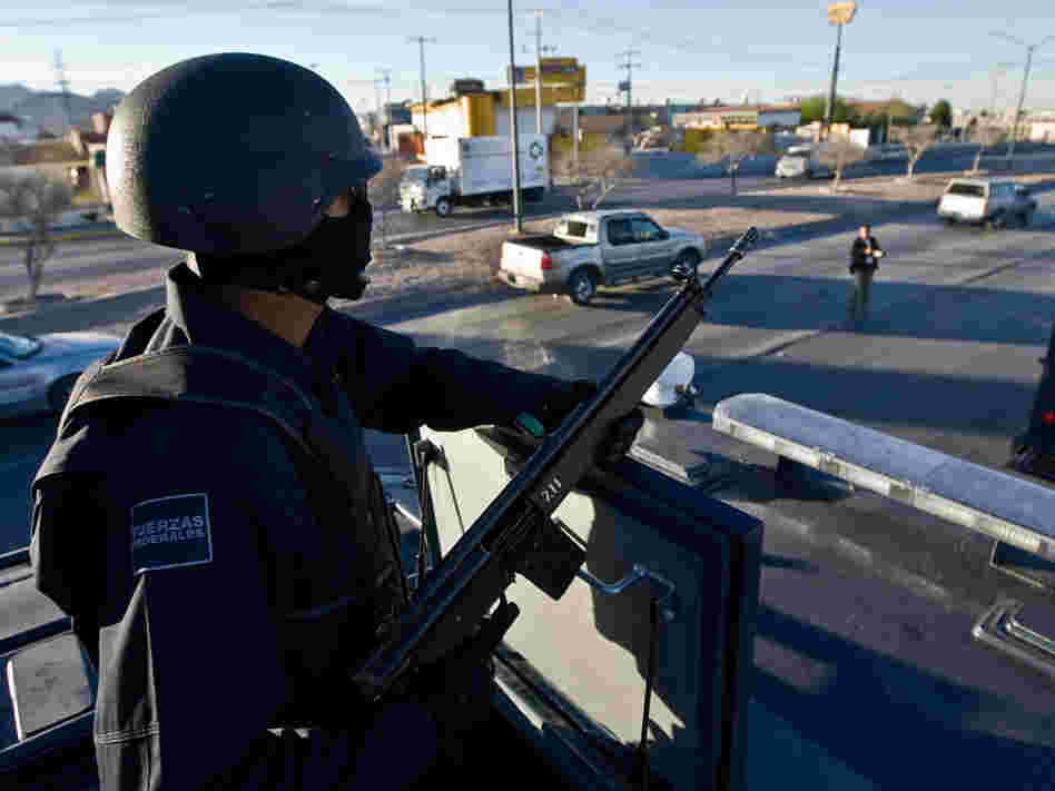 Mexican federal police patrol the Ciudad Juarez streets during an anti-narcotics operation in 2009.