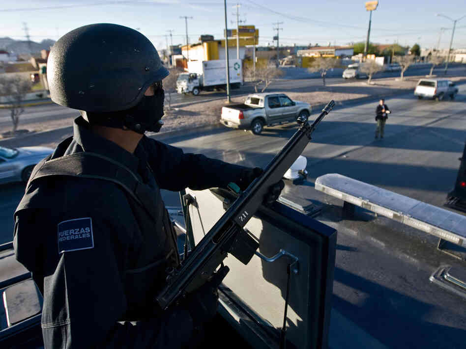Mexican federal police patrol the Ciudad Juarez streets during an anti-narcotics operation in 2009.
