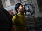Muhammad Yasir, 23, lifts free weights at Gold's Gym in Gujranwala, Pakistan. Muhammad Yasir, 23, lifts free weights at Gold's Gym in Gujranwala, Pakistan.