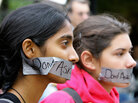 Harvard Law students Vaidya Gullapalli and Kristin Small protest the "don't ask, don't tell" policy. Harvard Law students Vaidya Gullapalli and Kristin Small protest the "don't ask, don't tell" policy.