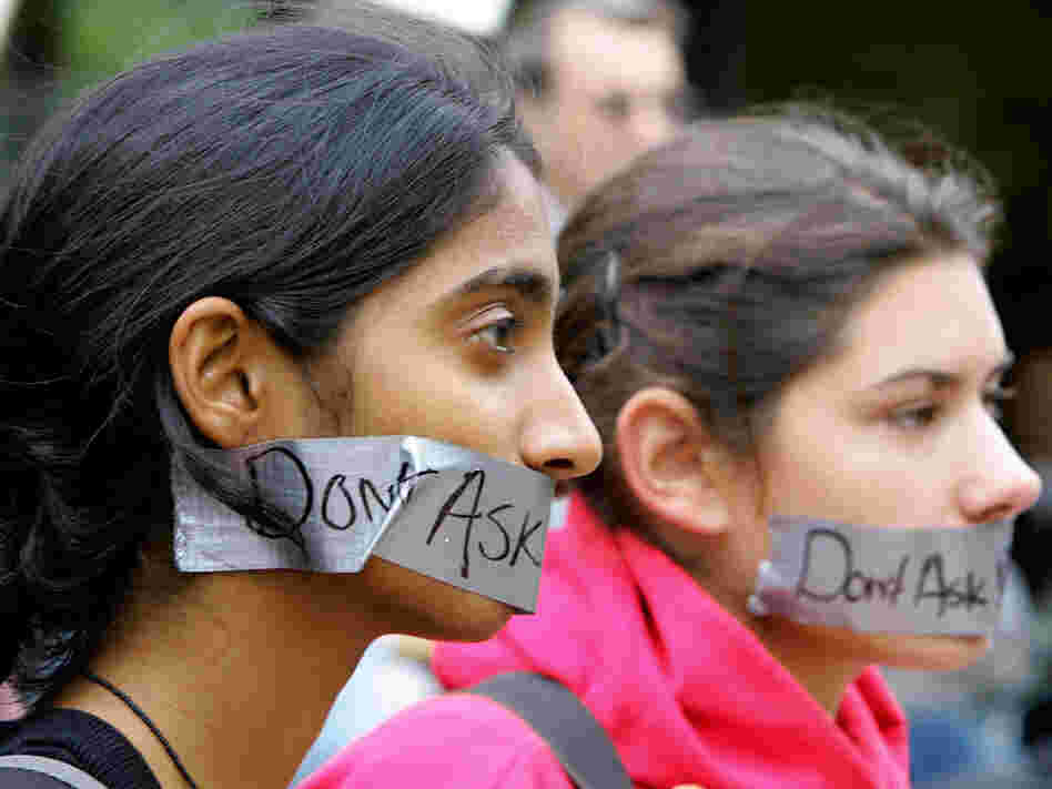 Harvard Law students Vaidya Gullapalli and Kristin Small protest the "don't ask, don't tell" policy.