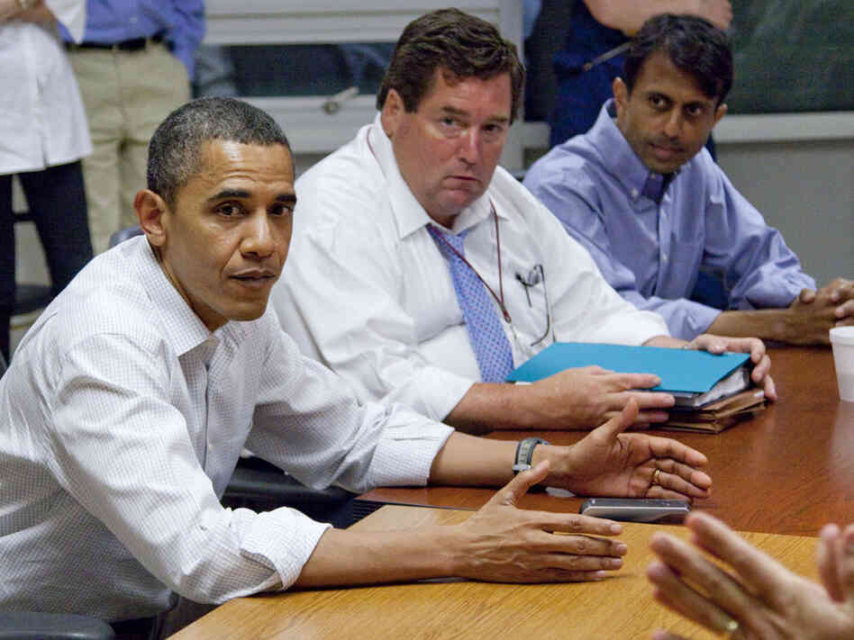 President Obama, accompanied by Billy Nungesser and Bobby Jindal, receives a briefing on the oil