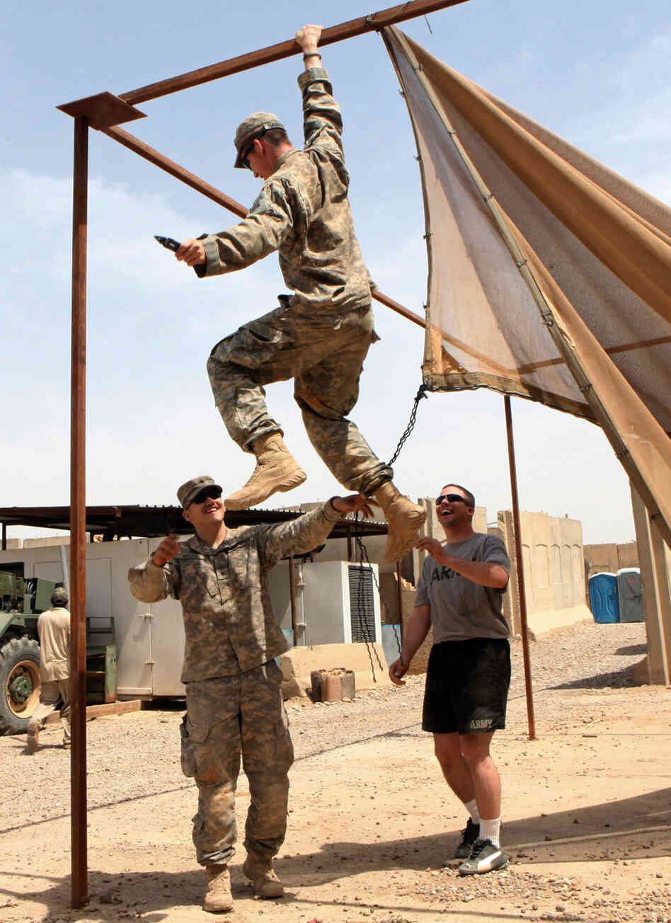 U.S. soldiers work to strike their camp as they prepare to leave their base. U.S. soldiers work to strike their camp as they prepare to leave their base.