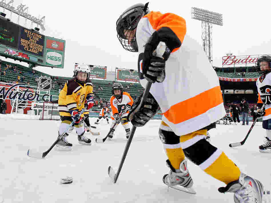 Youth teams play before the New Year's Day Winter Classic NHL hockey game.