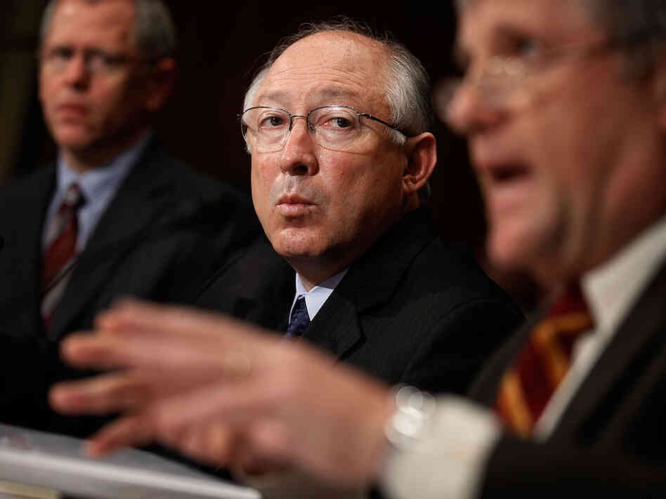 Interior Secretary Ken Salazar (center) and other Interior officials testifies on Capitol Hill.