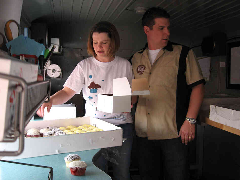 Sean and Denon Moore in their cupcake truck in Denver.