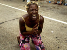 A desperate woman pleas for help following Hurricane Katrina A desperate woman pleas for help following Hurricane Katrina