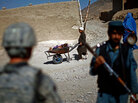 Afghan police and U.S. Army soldiers work together during joint patrol Afghan police and U.S. Army soldiers work together during joint patrol