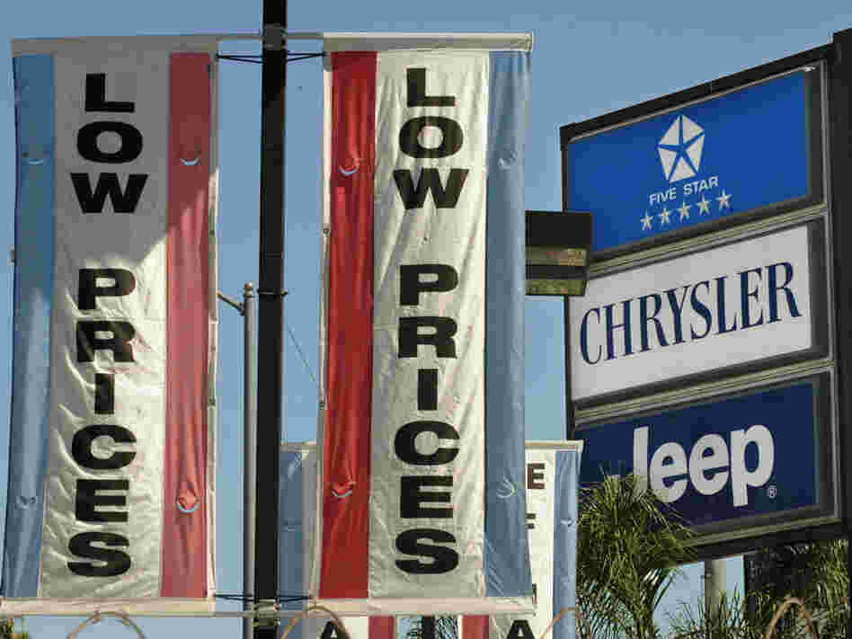 Signs at a Los Angeles Chrysler dealership.