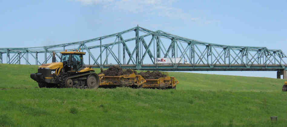 A tractor to performs maintenance on a levee in Granite City, Ill. A tractor to performs maintenance on a levee in Granite City, Ill.