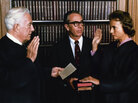 Justice O'Connor, right, is sworn in by Chief Justice Warren Burger, left, with her husband. Justice O'Connor, right, is sworn in by Chief Justice Warren Burger, left, with her husband.