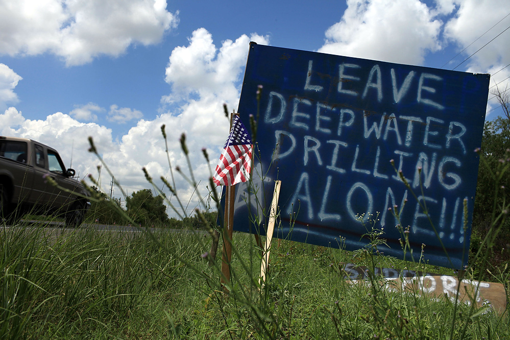 A homemade sign voices support for the oil industry in Houma, La.