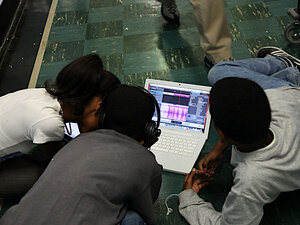 Quest to Learn students work on a podcast.