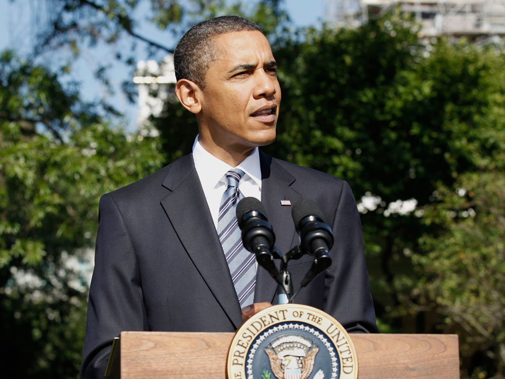 President Obama addresses the media on the South Lawn of the White House.