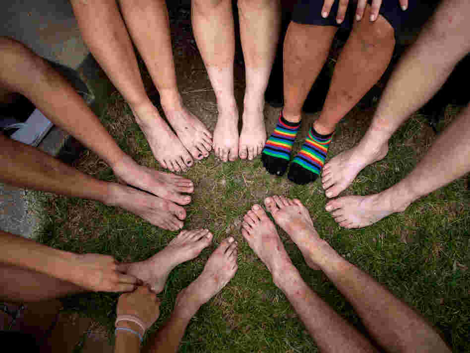 Hikers show their feet