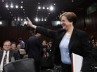 Elena Kagan waves at the start of the third day of her confirmation hearings. Elena Kagan waves at the start of the third day of her confirmation hearings.
