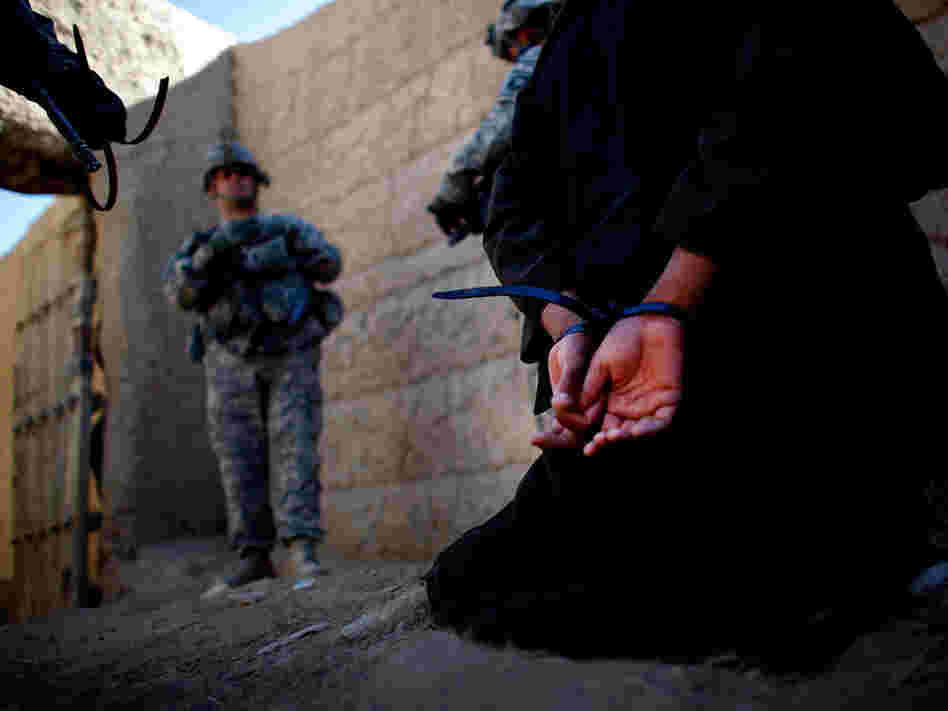 A man suspected of helping the Taliban in grenade attacks