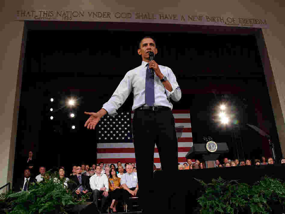 President Obama answers a question in Racine, Wis.