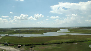 Channels and bayous crisscross the marsh grasses in Cocodrie, La. Over the years, the cutting of channels for oil and gas exploration has contributed to Louisiana's receding coastline.