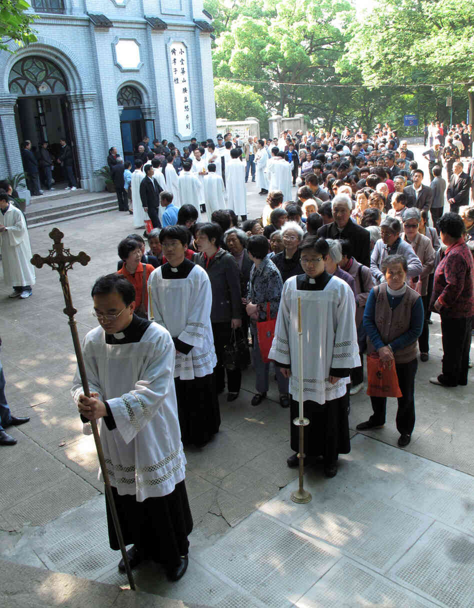 Clergy from the government-sanction Catholic church proceed to the Sheshan basilica outside Shanghai Clergy from the government-sanction Catholic church proceed to the Sheshan basilica outside Shanghai