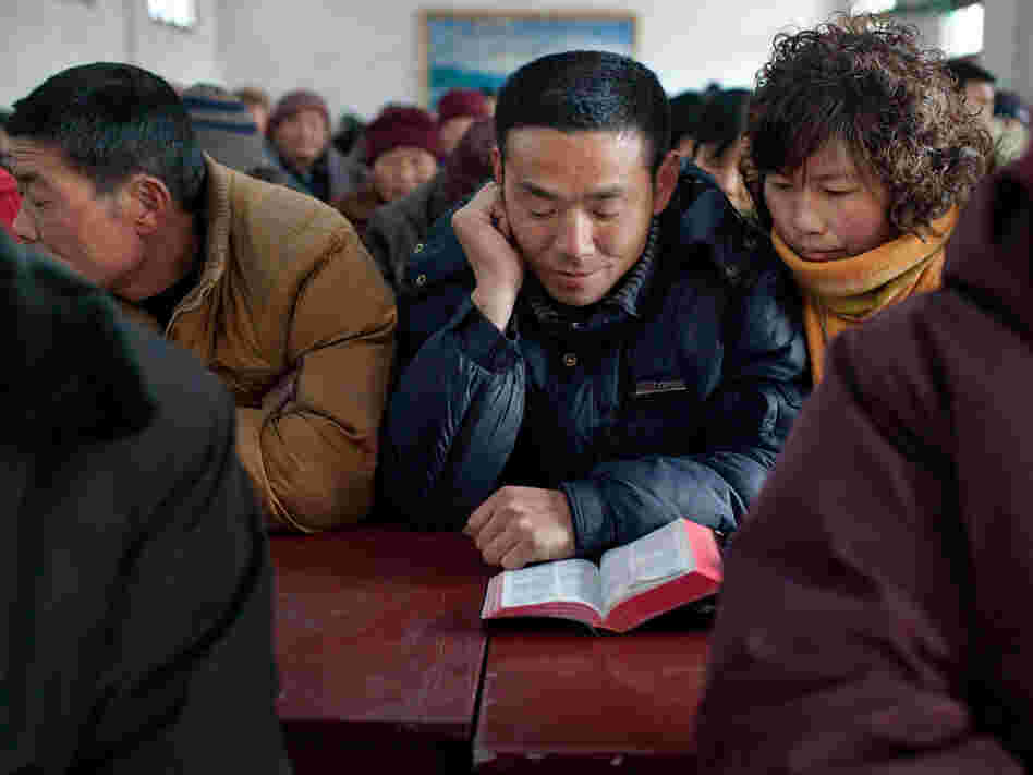 Worshippers attend a service at a Christian church in China's Protestant heartland