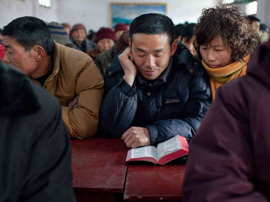 Worshippers attend a service at a Christian church in China's Protestant heartland