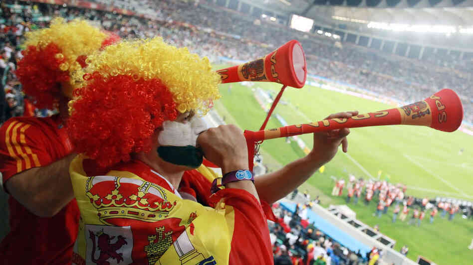 Spain fans play a vuvuzela at the end of the Spain-German match in Durban, South Africa. Spain fans play a vuvuzela at the end of the Spain-German match in Durban, South Africa.