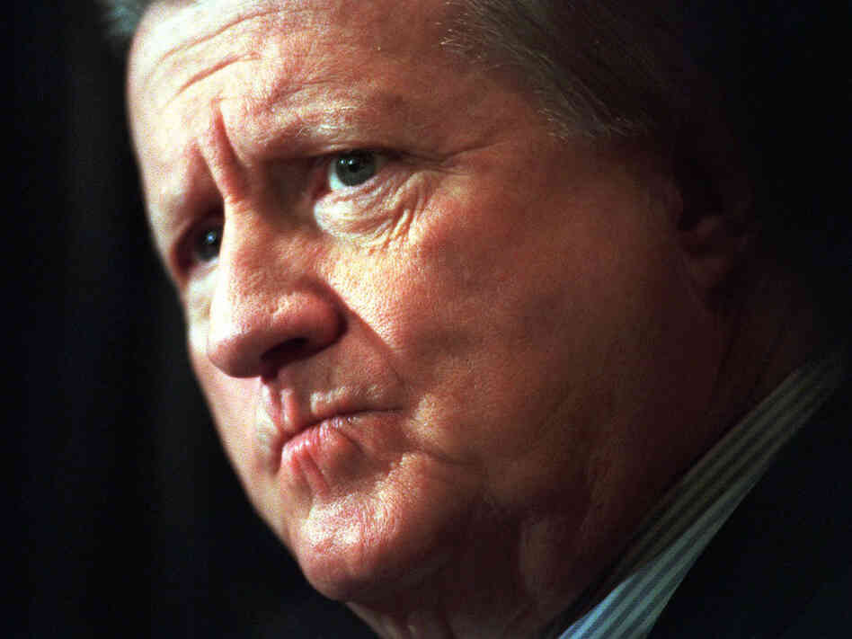 George Steinbrenner listens to reporter's question in 1998