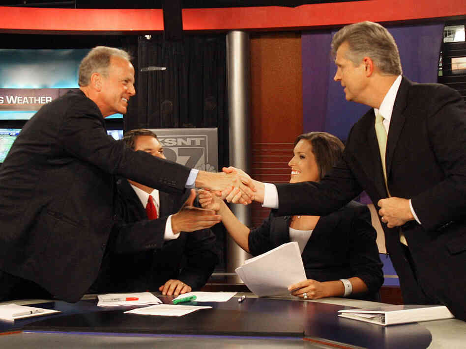 Jerry Moran and Todd Tiahrt shake hands after their first televised debate July 6.