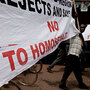 Ugandans take part in an anti-gay demonstration in Kampala in February.