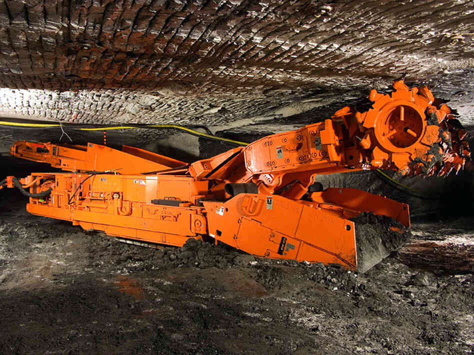 A continuous miner machine.