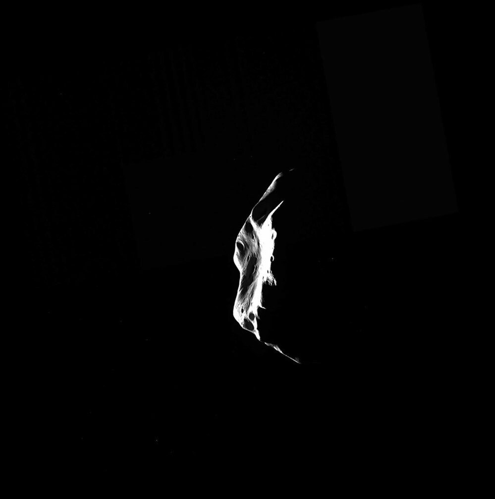Asteroid Lutetia fades in the shadow after Rosetta's passing