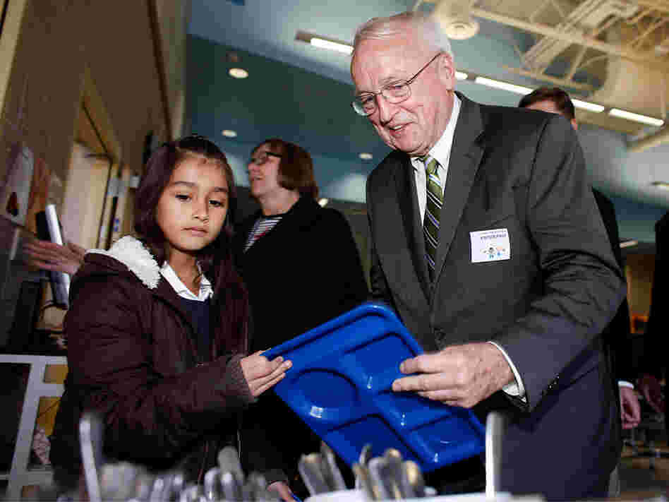 USDA Undersecretary for Food Kevin Concannon meets with kids at an elementary school in Denver.