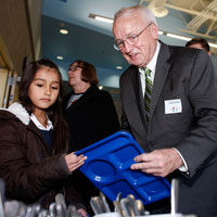 USDA Undersecretary for Food Kevin Concannon meets with kids at an elementary school in Denver.