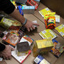 Volunteers sorted through food as they stocked shelves at the San Francisco Food Bank in California Volunteers sorted through food as they stocked shelves at the San Francisco Food Bank in California