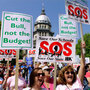 Thousands of people protest budget cuts at the Illinois State Capitol in Springfield on April 21.