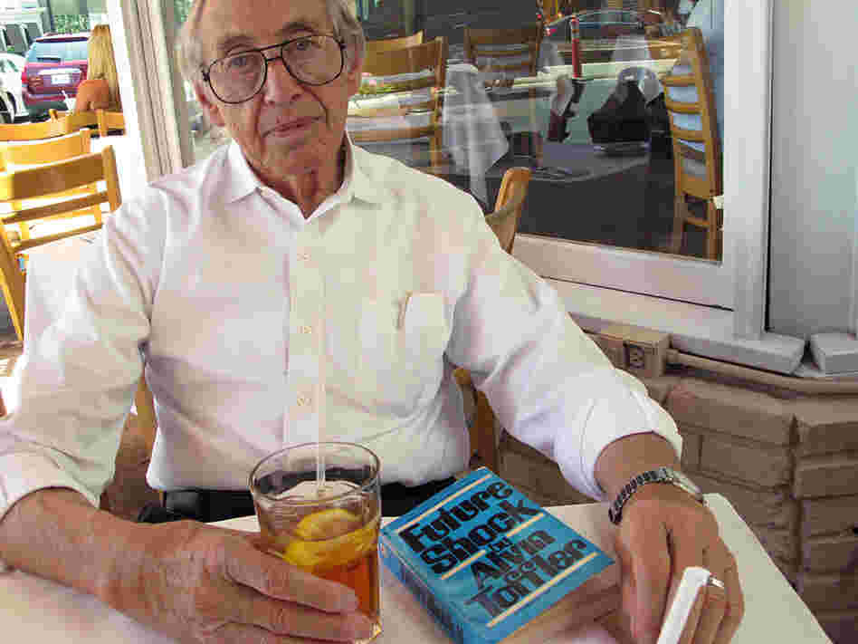 Alvin Toffler, author of "Future Shock", sits at a restaurant on Sunset Blvd in Los Angeles.