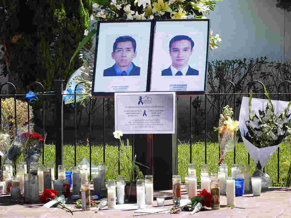 Portraits of two university students killed in drug war crossfire in Monterrey