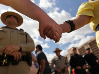 The Arizona law has sparked protests like this one in Phoenix on May 1.