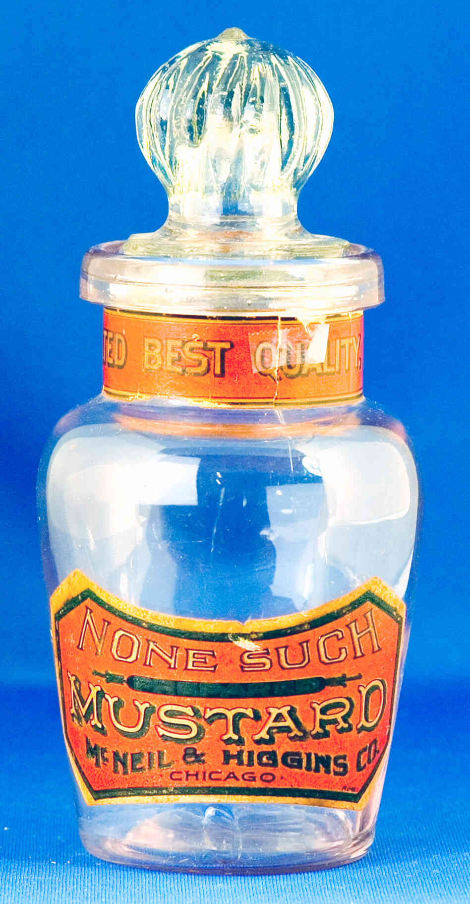 A pot of McNeil and Higgins' Nonesuch Mustard.