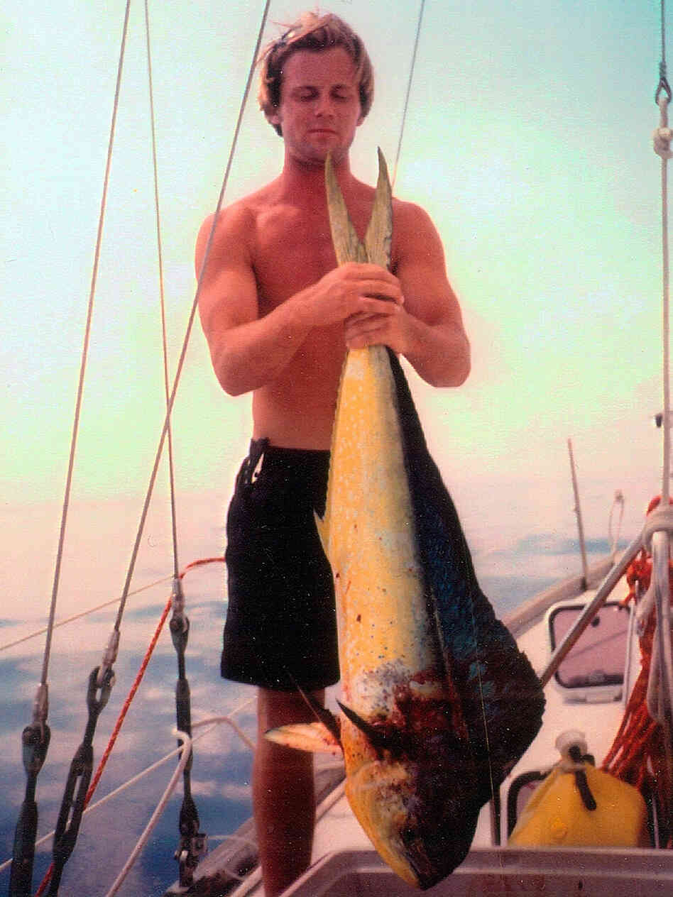 In this 1999 photo, Tom Davis holds a mahi-mahi caught during a sail across the Gulf of Mexico. In this 1999 photo, Tom Davis holds a mahi-mahi caught during a sail across the Gulf of Mexico.