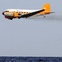 A dispersant plane passes over an oil skimmer in the Gulf of Mexico on April 27, 2010. A dispersant plane passes over an oil skimmer in the Gulf of Mexico on April 27, 2010.