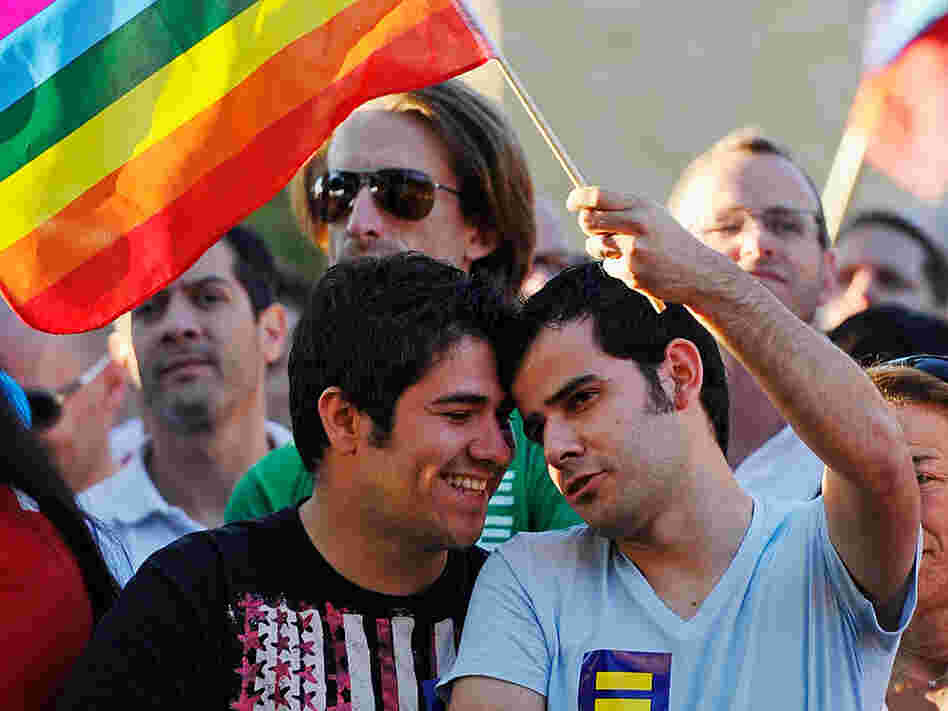 Prop 8 opponents listen to speakers during a rally to celebrate the ruling to overturn Proposition 8