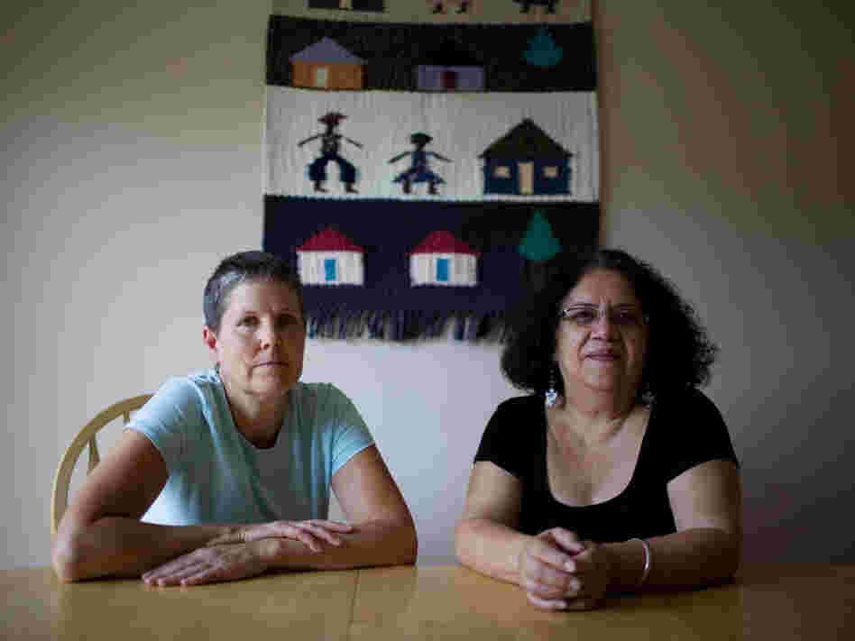 Nancy Lyall (left) and Teresita Jacinto work for Mexicans Without Borders.